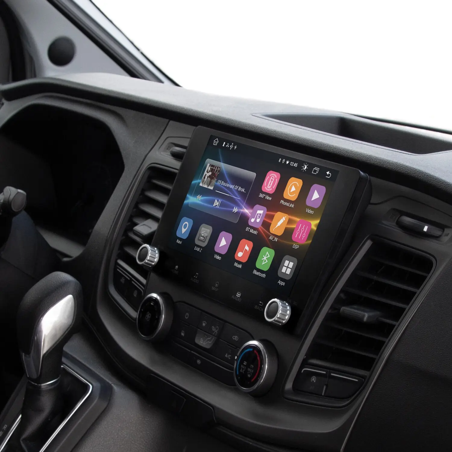 Navigationssystem ESX Vision VNC940 TRC 4G im Armaturenbrett eines Autos, großes Touchscreen mit bunten App-Symbolen und Knöpfen darunter