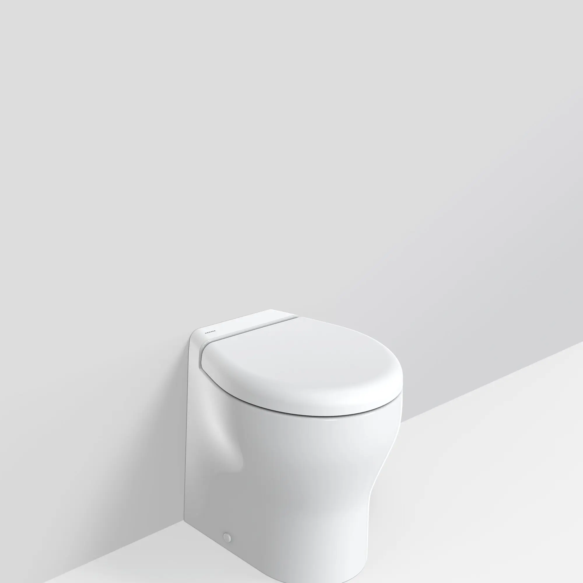 Weiße moderne Zerhackertoilette Elegance in Frontansicht mit geschlossenem Deckel, glatte Keramikoberfläche, helles Badezimmerhintergrund