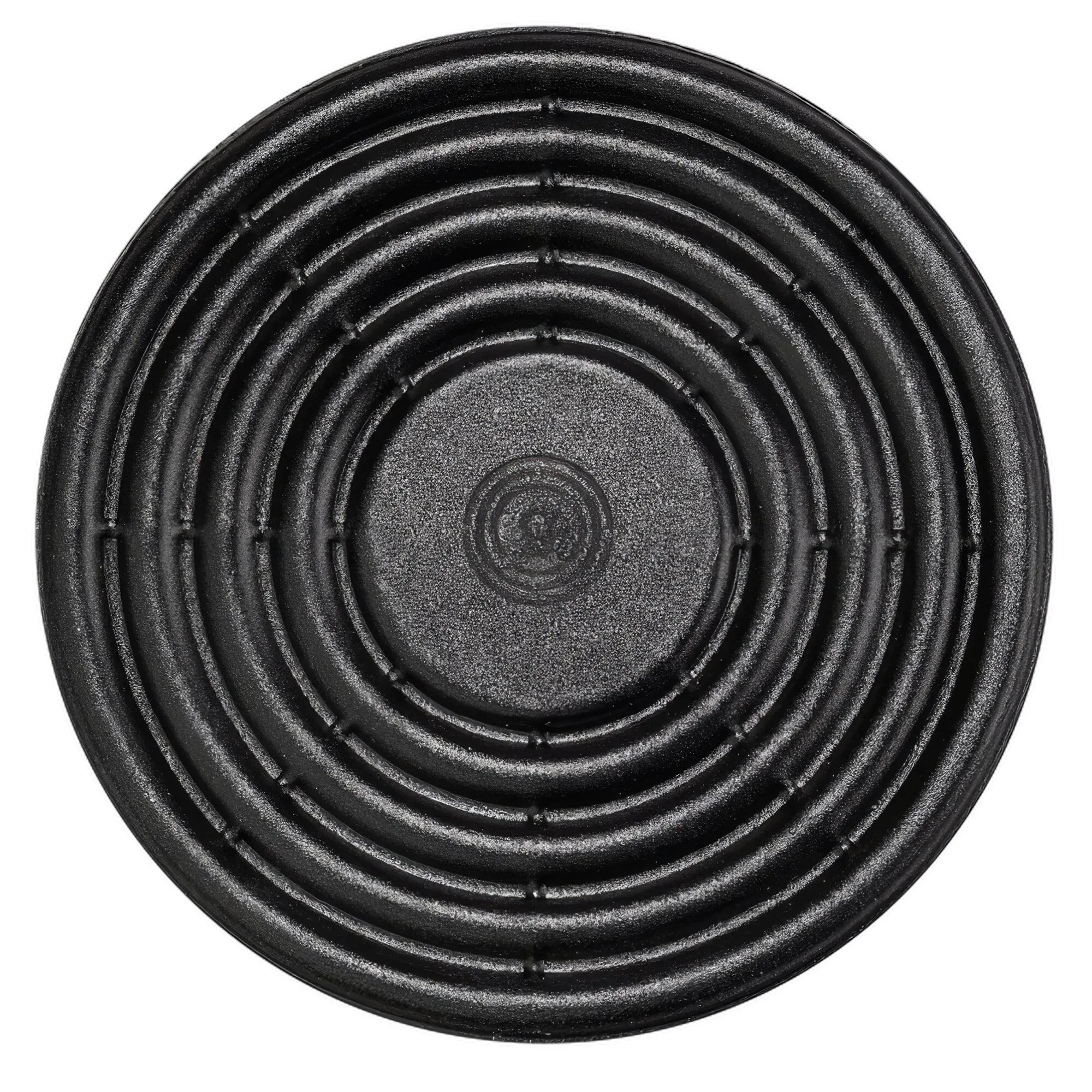 Detailaufnahme eines schwarzen, runden MagUp-Pad mit konzentrischen Rippen; sichtbare, strukturierte Oberfläche und zentrale Verdickung