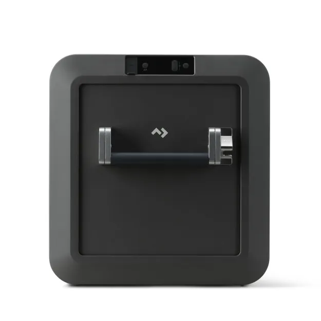 Dometic Kühlbox CFX5 55 in dunklem Grau, seitliche Ansicht mit eingelassenem Deckel, Tragegriff und Bedienfeld oben