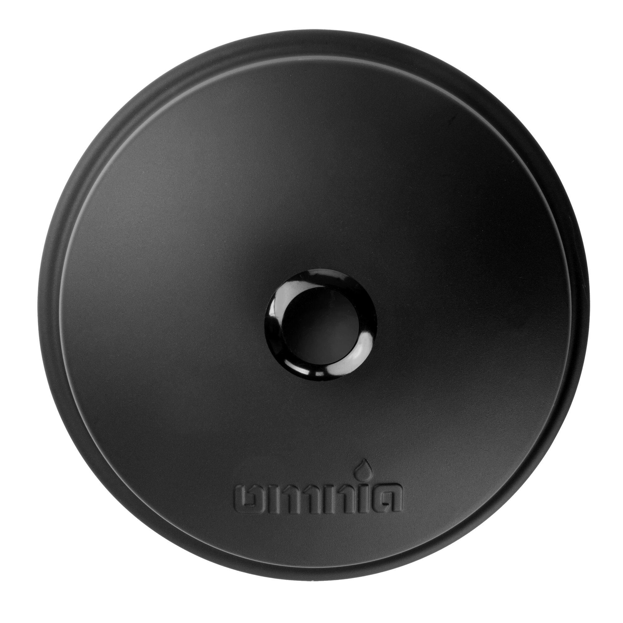 Runder schwarzer Deckel aus Metall mit glatter Oberfläche, zentralem Loch und umlaufender Kante