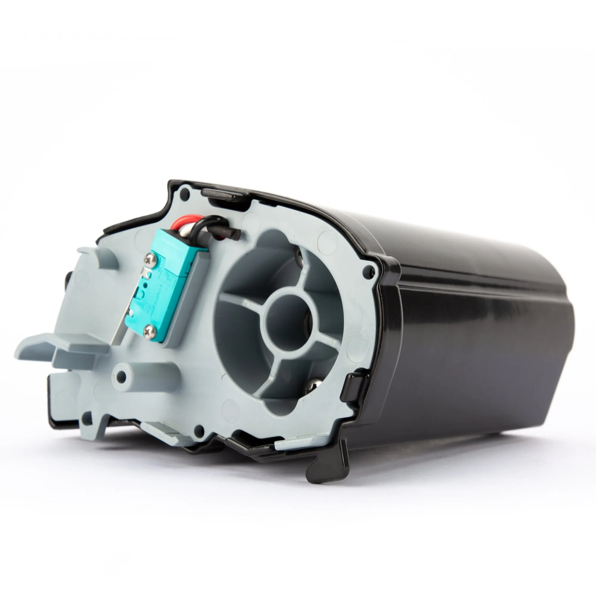 Schwarzes Motor Kit Compact F80s in Detailansicht mit geöffneter Abdeckung, sichtbarem Lüfterrad und türkisfarbenem Anschlussmodul