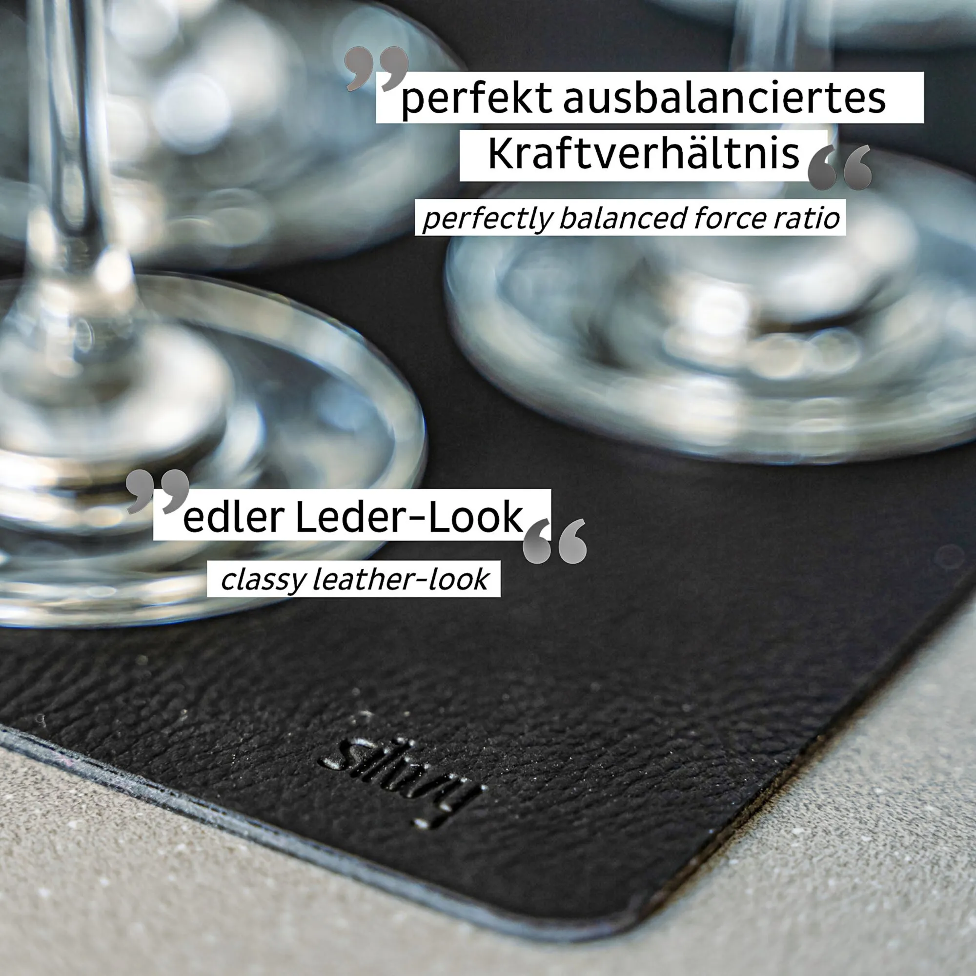 Schwarze Metall-Nano-Gel-Matte mit strukturierter Oberfläche und mehreren glänzenden Metallteilen in Nahaufnahme