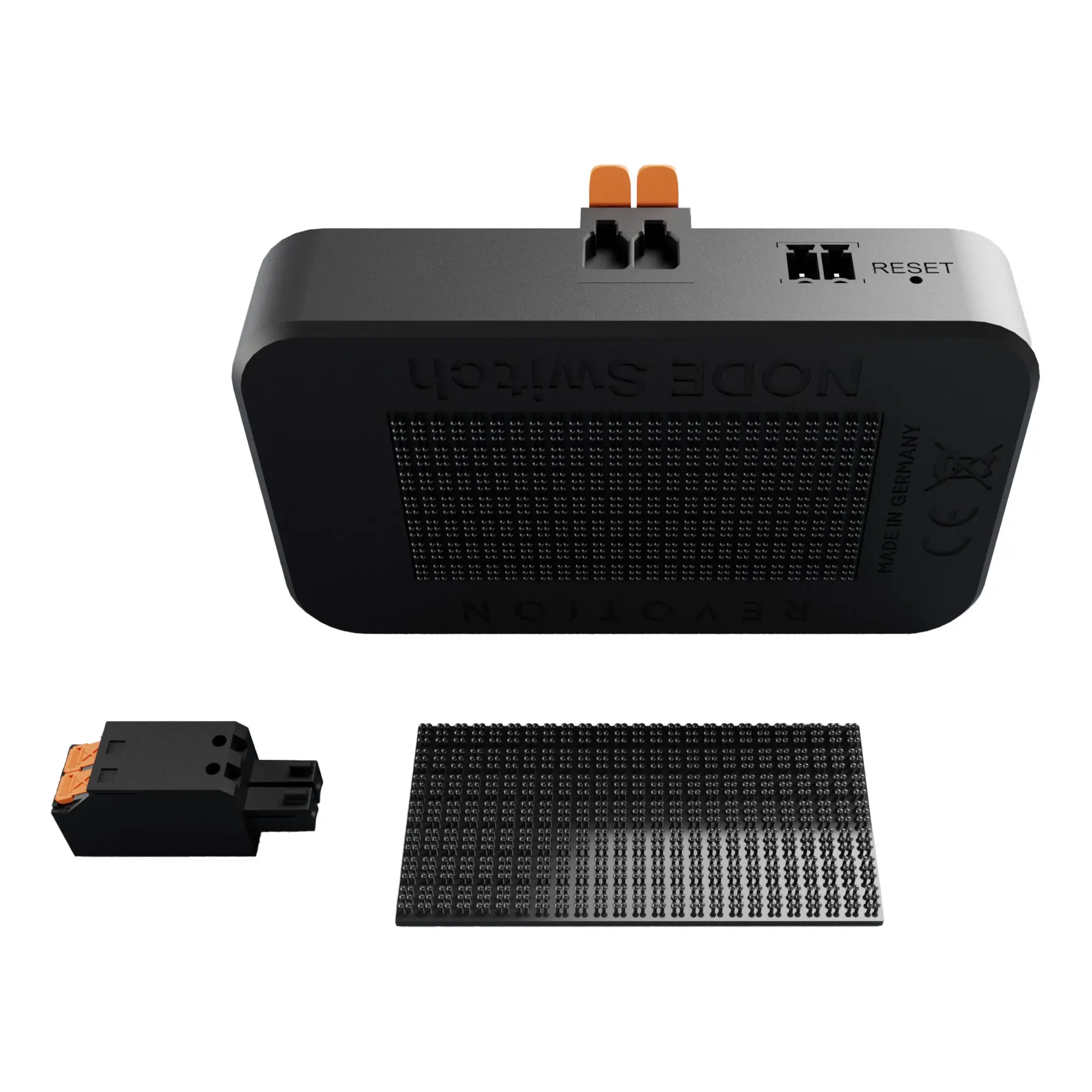 Schwarzes Gerät NODE Switch: perforierte Front, oben zwei orange Klemmen, rechts RESET-Feld, seitlich MADE IN GERMANY sichtbar