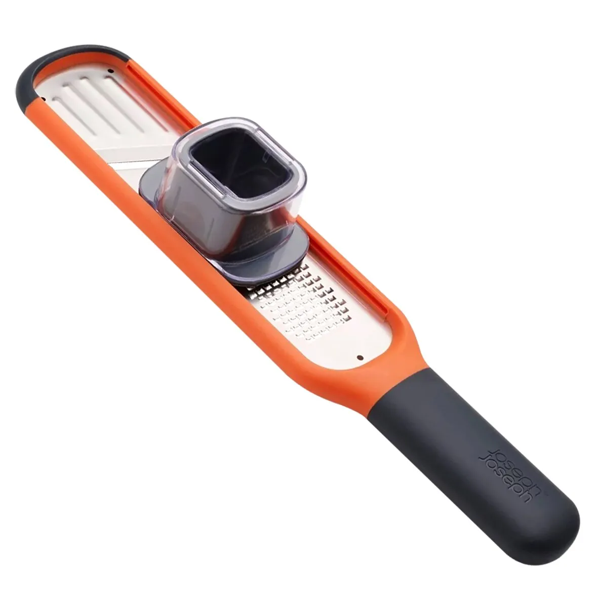 Orange-schwarze Minireibe mit feiner Edelstahlreibfläche, grober Hobelklinge und schwarzem Fingerschutz sowie Griff 
