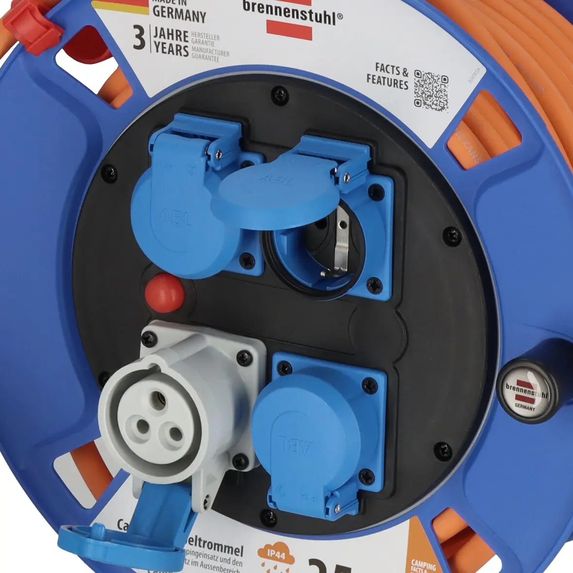 Kabeltrommel Garant CEE Camping/Maritim mit blauem Gehäuse, orange Verlängerungskabel, vorn zwei blaue Klappdeckel für CEE-Steckdosen und eine weiße dreipolige Steckdose
