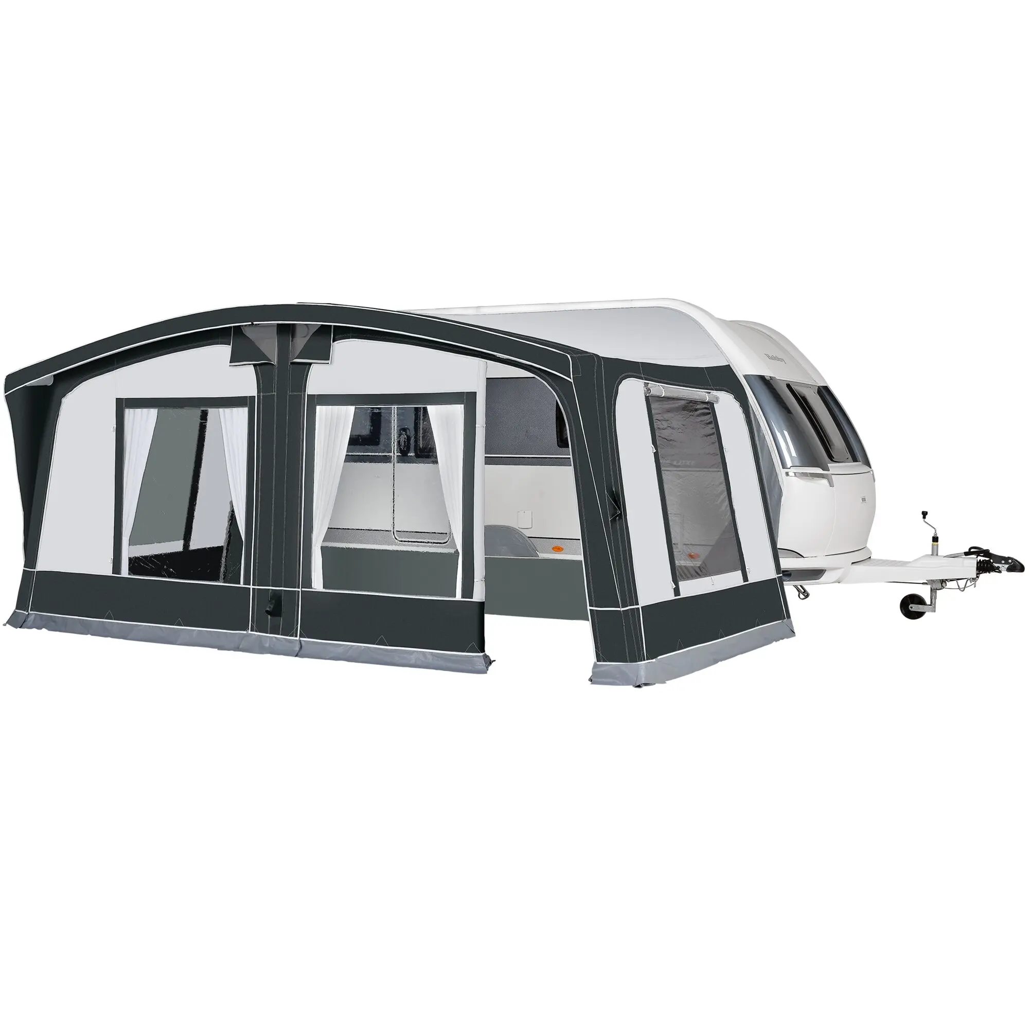 Seitenansicht eines Octavia Air Reisevorzelts, an einen Caravan angeschlossen; dunkler Wohnbereich mit großen Fenstern und Tür