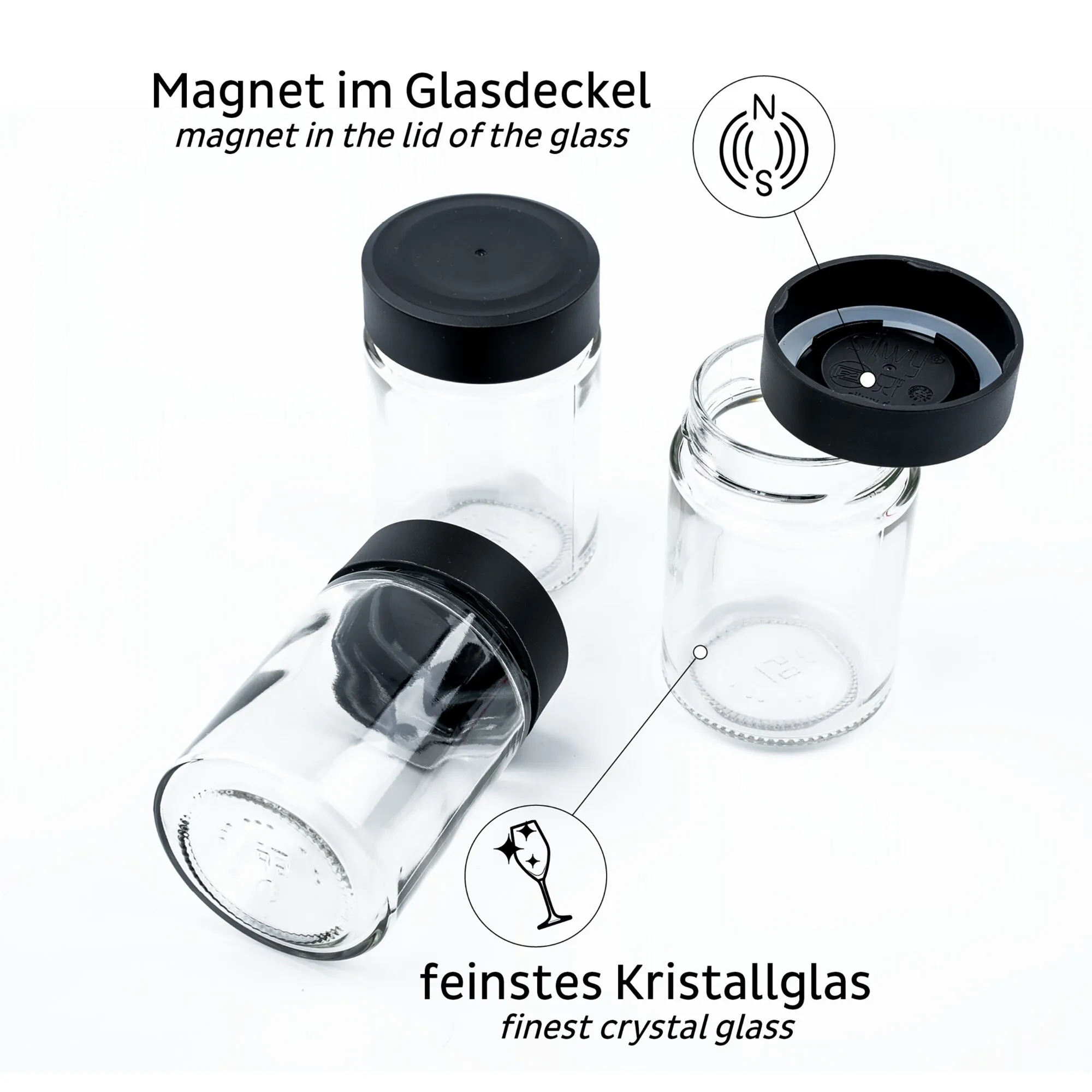 Magnetgläser Feinkost CLASSY aus klarem Kristallglas mit schwarzen Deckeln, teils geöffnet und mit Magnet im Glasdeckel