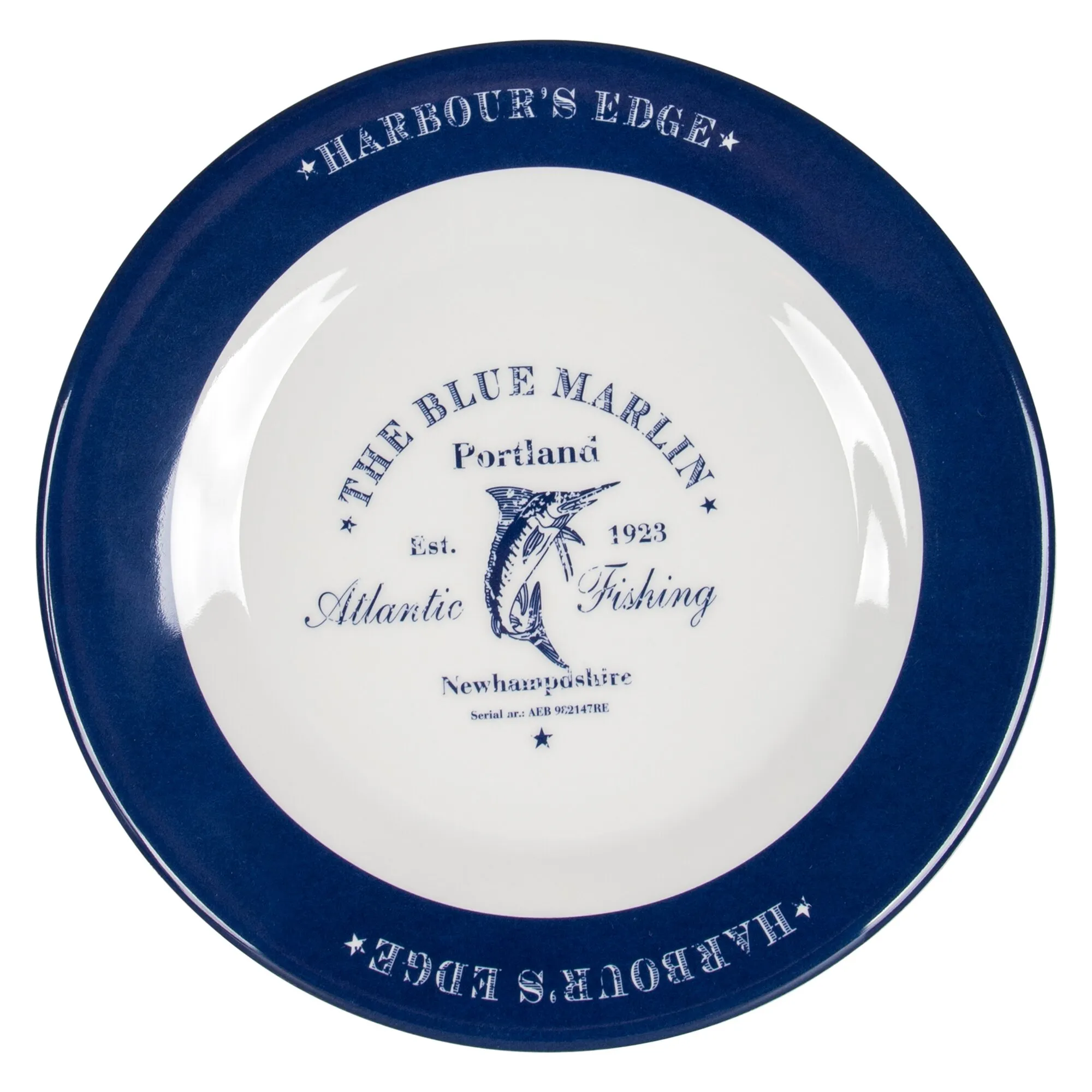 Runder weißer Teller des Geschirrsets Blue Marlin mit dunkelblauem Rand, Sternen und maritimem Fischmotiv in der Mitte
