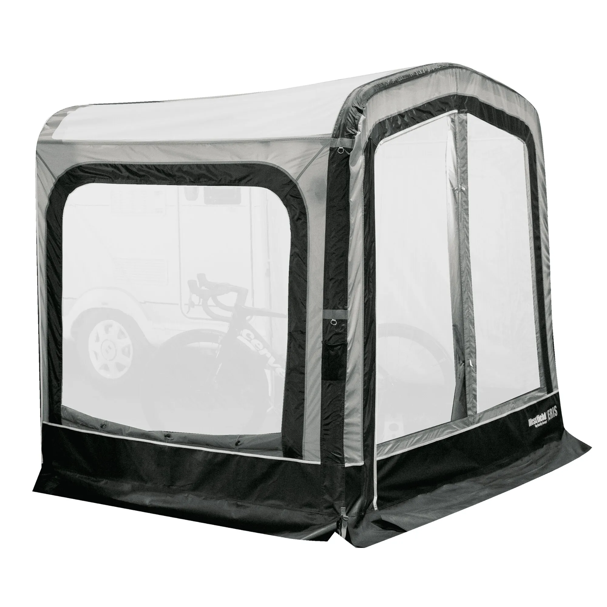 Grauschwarzer Anbau Eris für Vorzelte mit großen transparenten Fenstern, Eingangstür und abgeschrägtem Dach, Fahrrad und Wohnwagen sichtbar