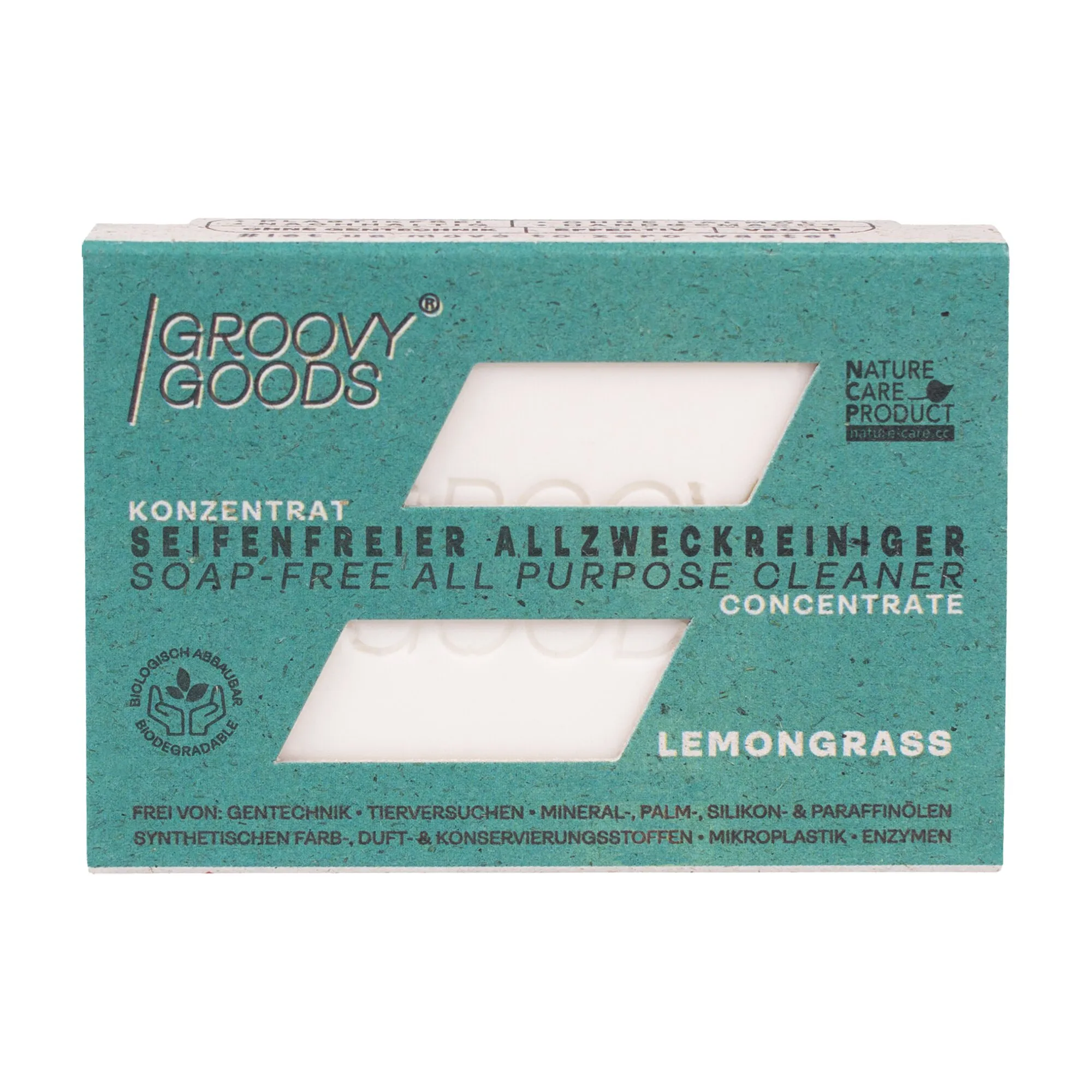 Türkise Verpackung von Groovy Goods mit seifenfreiem Allzweckreiniger-Konzentrat in der Duftrichtung Lemongrass